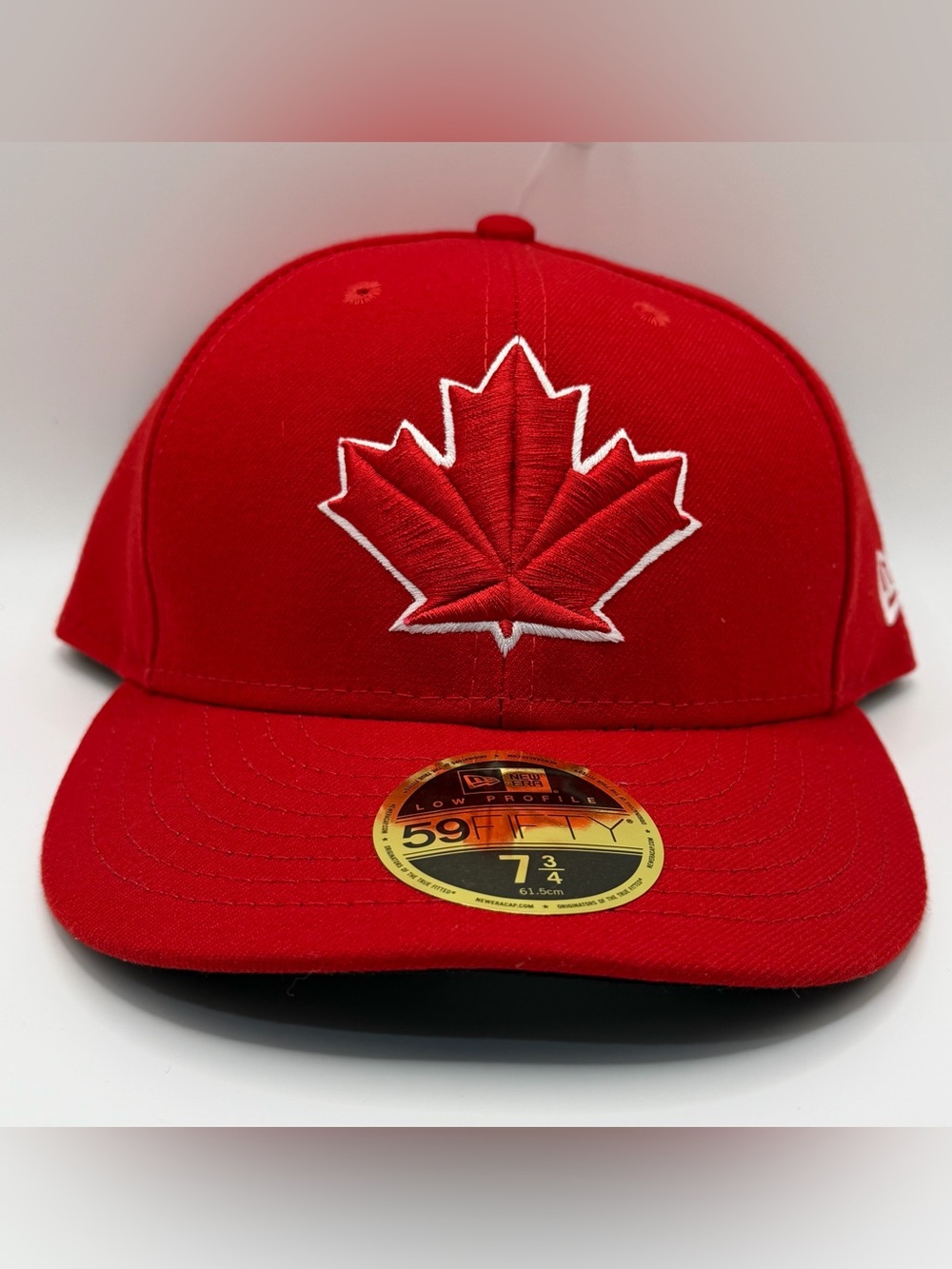 Toronto Blue Jays New Era 59FIFTY Fitted MLB Red Maple Leaf Cap Size 7 3/4